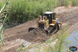 ‘’Continúan los trabajos de limpieza, desazolve y encauzamiento de ríos’’ en Tamazula
