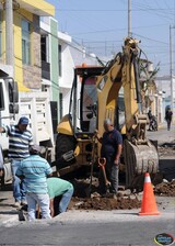 Reparación de red de drenaje sanitario por colapso y restauración de 100 metros lineales de la calle Manuel Chávez Madrueño.